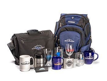 Silverscreen-branded promotional items: a messenger bag, a backpack, mugs, glasses, a tumbler and a flask