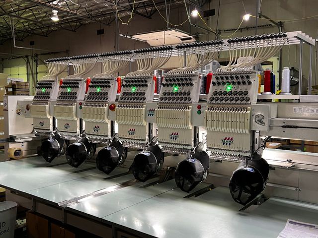 Six-head embroidery machine stitching black caps